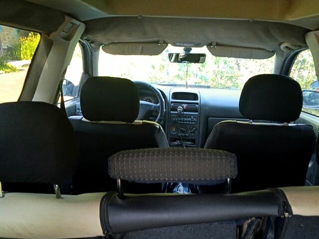 Синий Опель Астра, объемом двигателя 1.7 л и пробегом 200 тыс. км за 2000 $, фото 2 на Automoto.ua