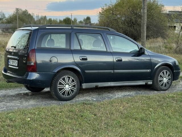 Синий Опель Астра, объемом двигателя 2 л и пробегом 250 тыс. км за 2350 $, фото 3 на Automoto.ua