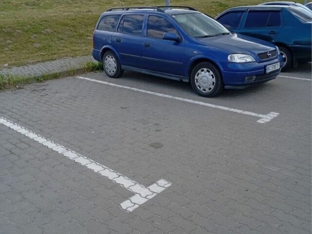 Синий Опель Астра, объемом двигателя 1.2 л и пробегом 200 тыс. км за 1500 $, фото 2 на Automoto.ua