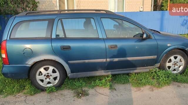 Синій Опель Астра, об'ємом двигуна 2 л та пробігом 300 тис. км за 900 $, фото 1 на Automoto.ua