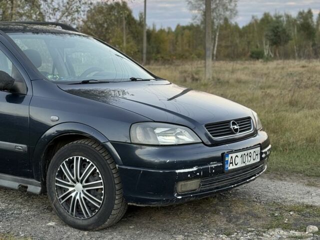 Синий Опель Астра, объемом двигателя 2 л и пробегом 250 тыс. км за 2350 $, фото 1 на Automoto.ua