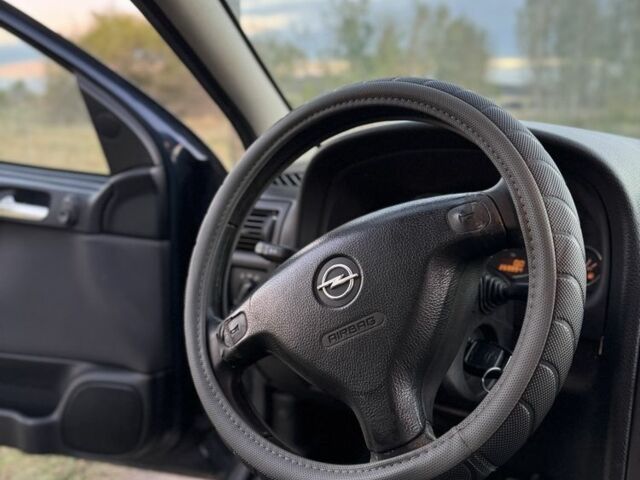 Синий Опель Астра, объемом двигателя 2 л и пробегом 250 тыс. км за 2350 $, фото 17 на Automoto.ua