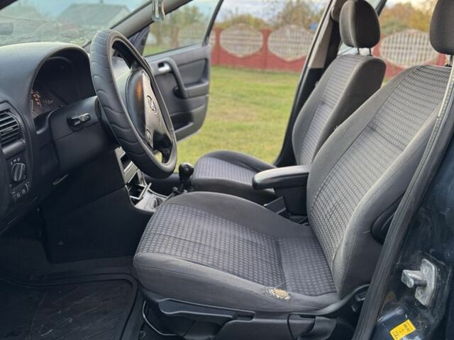 Синий Опель Астра, объемом двигателя 2 л и пробегом 250 тыс. км за 2350 $, фото 11 на Automoto.ua