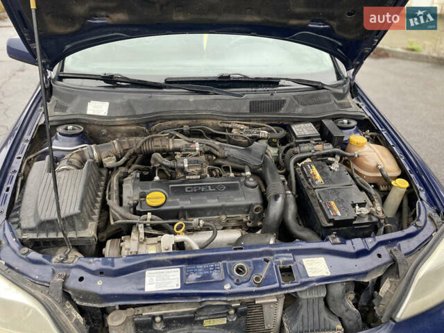 Синий Опель Астра, объемом двигателя 1.69 л и пробегом 353 тыс. км за 3500 $, фото 12 на Automoto.ua