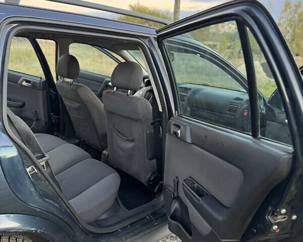 Синий Опель Астра, объемом двигателя 2 л и пробегом 250 тыс. км за 2350 $, фото 16 на Automoto.ua