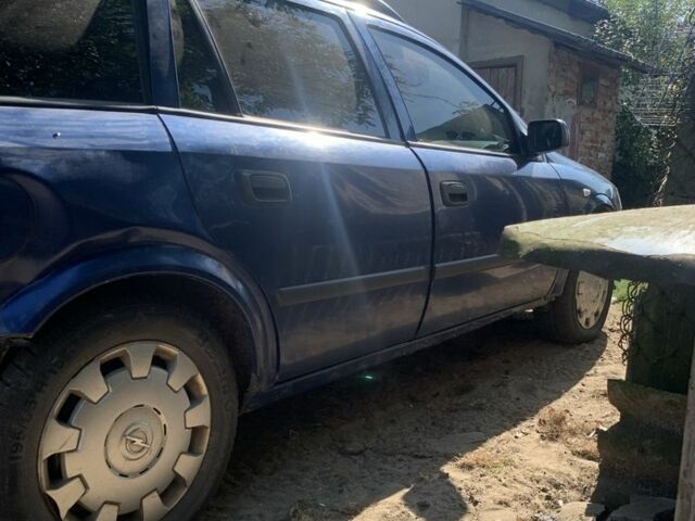 Синий Опель Астра, объемом двигателя 1.2 л и пробегом 200 тыс. км за 1500 $, фото 3 на Automoto.ua