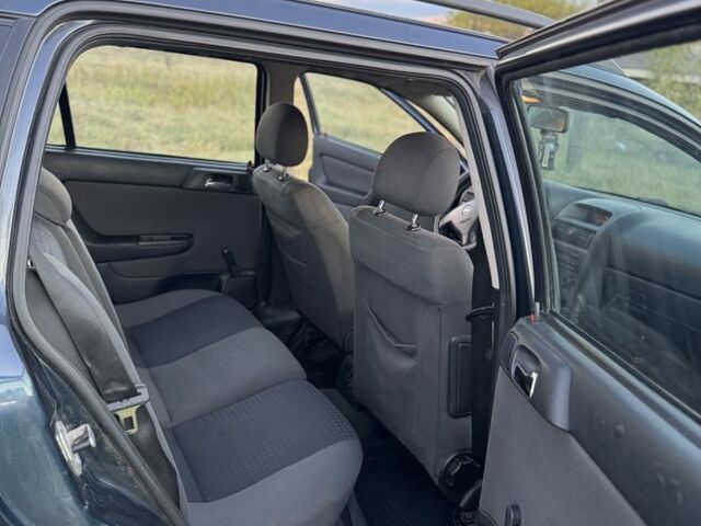 Синий Опель Астра, объемом двигателя 2 л и пробегом 250 тыс. км за 2350 $, фото 14 на Automoto.ua