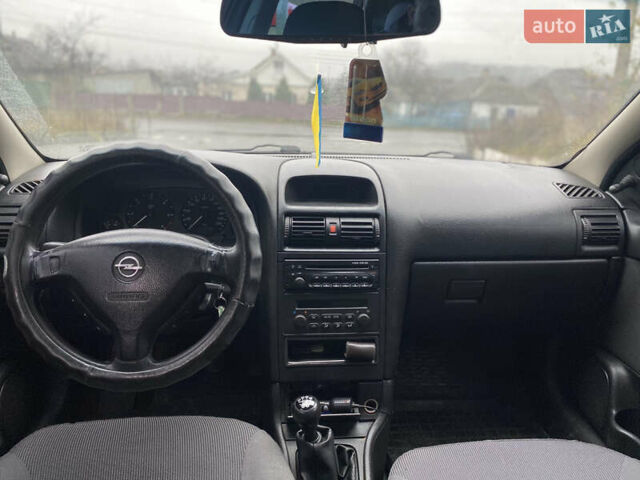 Синий Опель Астра, объемом двигателя 1.69 л и пробегом 353 тыс. км за 3500 $, фото 9 на Automoto.ua