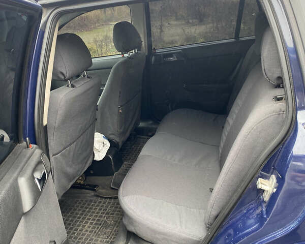 Синий Опель Астра, объемом двигателя 1.69 л и пробегом 353 тыс. км за 3500 $, фото 10 на Automoto.ua