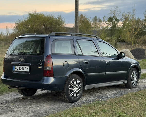 Синий Опель Астра, объемом двигателя 2 л и пробегом 250 тыс. км за 2350 $, фото 4 на Automoto.ua