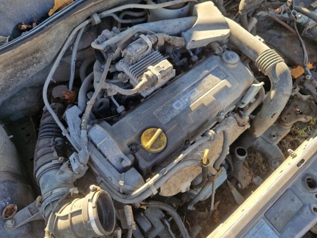 Синий Опель Астра, объемом двигателя 1.7 л и пробегом 220 тыс. км за 500 $, фото 2 на Automoto.ua