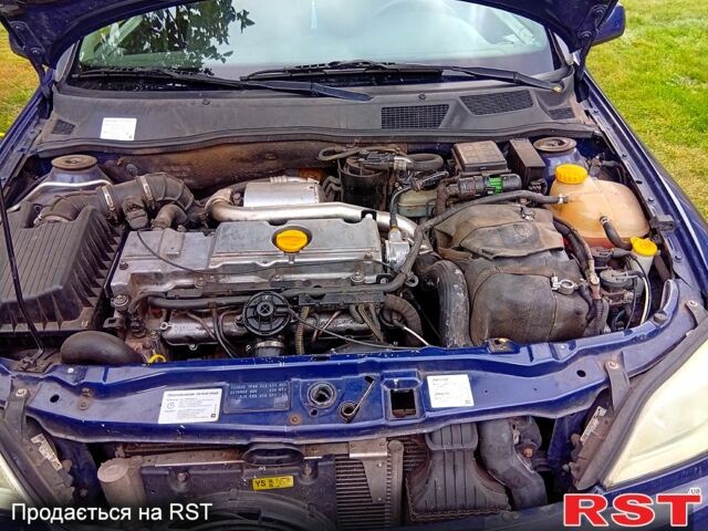 Синий Опель Астра, объемом двигателя 2 л и пробегом 245 тыс. км за 3200 $, фото 2 на Automoto.ua