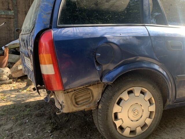 Синий Опель Астра, объемом двигателя 1.2 л и пробегом 200 тыс. км за 1500 $, фото 4 на Automoto.ua