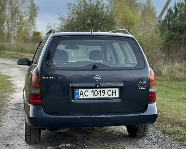Синий Опель Астра, объемом двигателя 2 л и пробегом 250 тыс. км за 2350 $, фото 6 на Automoto.ua