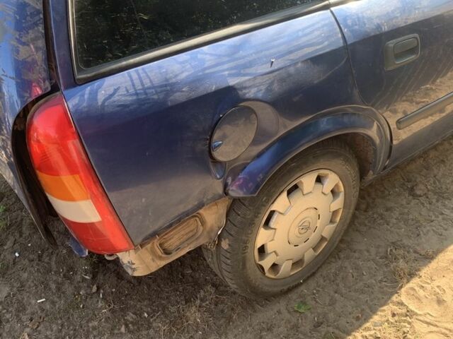 Синий Опель Астра, объемом двигателя 1.2 л и пробегом 200 тыс. км за 1500 $, фото 5 на Automoto.ua