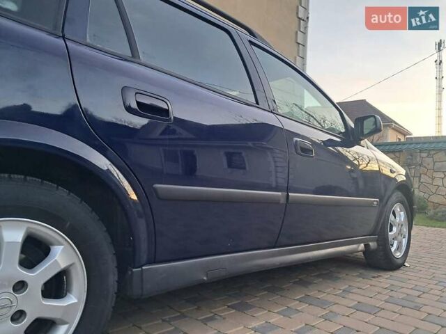 Синій Опель Астра, об'ємом двигуна 1.6 л та пробігом 233 тис. км за 3450 $, фото 37 на Automoto.ua