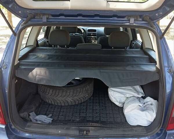 Синий Опель Астра, объемом двигателя 1.6 л и пробегом 233 тыс. км за 4300 $, фото 2 на Automoto.ua