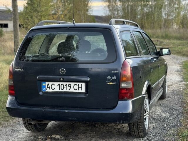 Синий Опель Астра, объемом двигателя 2 л и пробегом 250 тыс. км за 2350 $, фото 4 на Automoto.ua