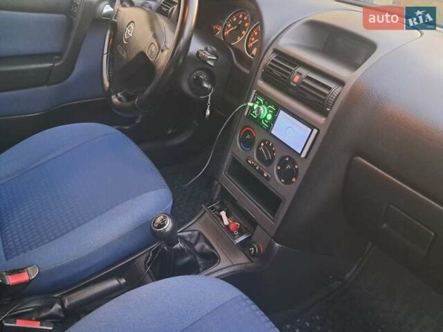 Синій Опель Астра, об'ємом двигуна 1.6 л та пробігом 233 тис. км за 3450 $, фото 54 на Automoto.ua