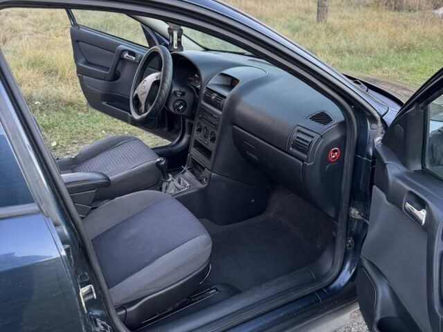 Синий Опель Астра, объемом двигателя 2 л и пробегом 250 тыс. км за 2350 $, фото 13 на Automoto.ua