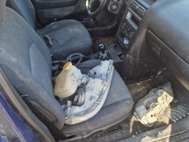 Синий Опель Астра, объемом двигателя 1.7 л и пробегом 220 тыс. км за 500 $, фото 3 на Automoto.ua