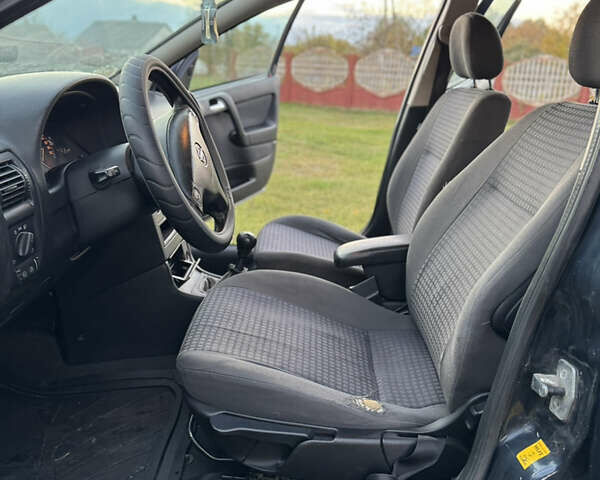 Синий Опель Астра, объемом двигателя 2 л и пробегом 250 тыс. км за 2350 $, фото 13 на Automoto.ua