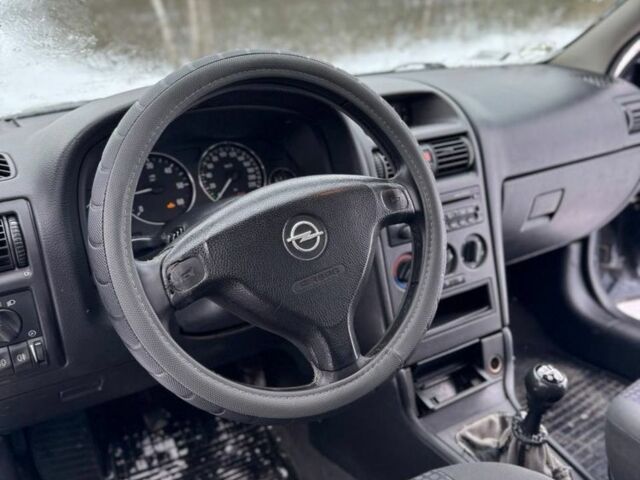 Синий Опель Астра, объемом двигателя 2 л и пробегом 270 тыс. км за 2500 $, фото 7 на Automoto.ua