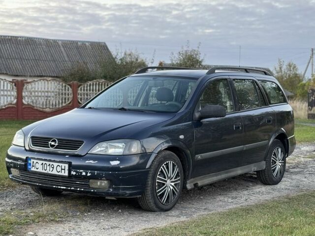 Синий Опель Астра, объемом двигателя 2 л и пробегом 250 тыс. км за 2350 $, фото 8 на Automoto.ua