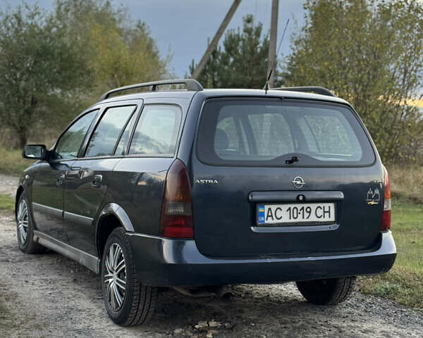 Синий Опель Астра, объемом двигателя 2 л и пробегом 250 тыс. км за 2350 $, фото 7 на Automoto.ua
