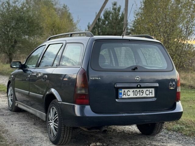 Синий Опель Астра, объемом двигателя 2 л и пробегом 250 тыс. км за 2350 $, фото 5 на Automoto.ua