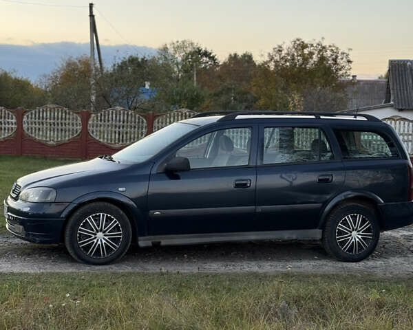 Синий Опель Астра, объемом двигателя 2 л и пробегом 250 тыс. км за 2350 $, фото 9 на Automoto.ua