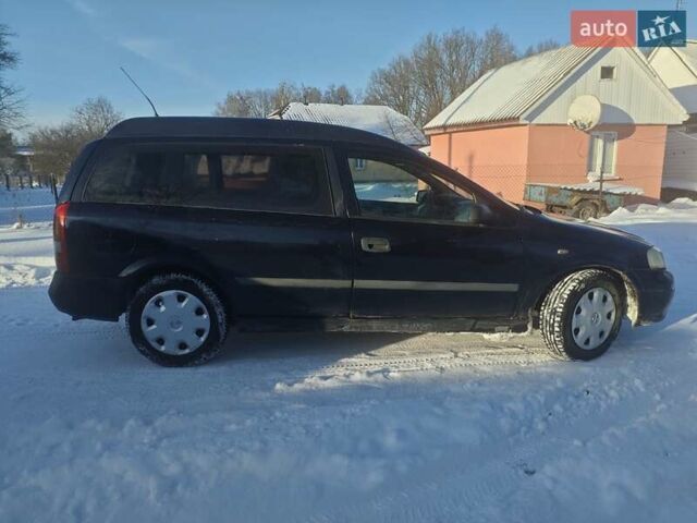 Синий Опель Астра, объемом двигателя 2 л и пробегом 400 тыс. км за 2150 $, фото 6 на Automoto.ua