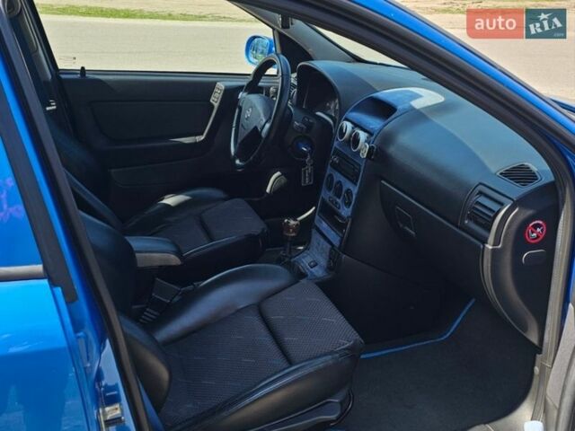 Синий Опель Астра, объемом двигателя 2 л и пробегом 250 тыс. км за 3950 $, фото 8 на Automoto.ua