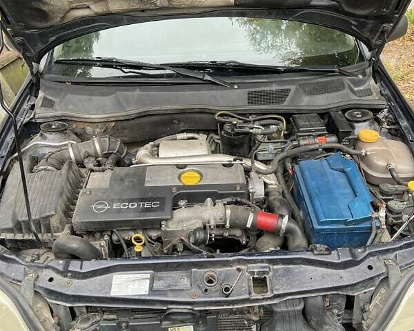Синий Опель Астра, объемом двигателя 2 л и пробегом 390 тыс. км за 2200 $, фото 4 на Automoto.ua