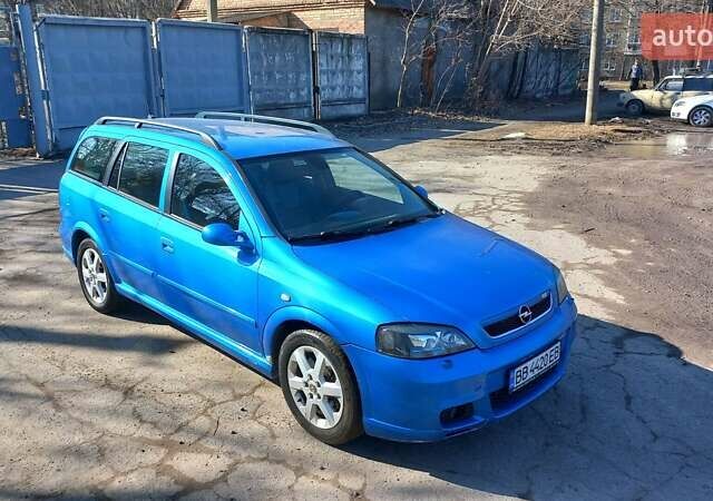 Синий Опель Астра, объемом двигателя 2 л и пробегом 250 тыс. км за 4000 $, фото 4 на Automoto.ua
