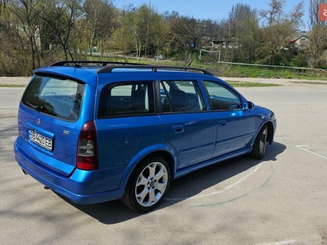 Синий Опель Астра, объемом двигателя 2 л и пробегом 250 тыс. км за 4000 $, фото 7 на Automoto.ua