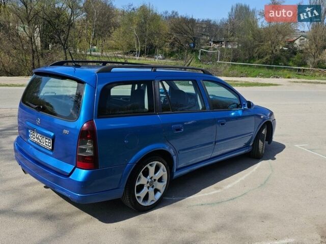 Синий Опель Астра, объемом двигателя 2 л и пробегом 250 тыс. км за 3950 $, фото 6 на Automoto.ua