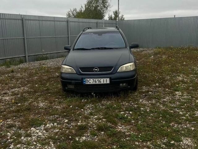 Синій Опель Астра, об'ємом двигуна 2 л та пробігом 300 тис. км за 1900 $, фото 1 на Automoto.ua