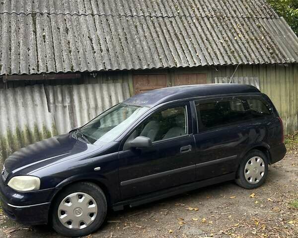 Синий Опель Астра, объемом двигателя 2 л и пробегом 390 тыс. км за 2200 $, фото 1 на Automoto.ua