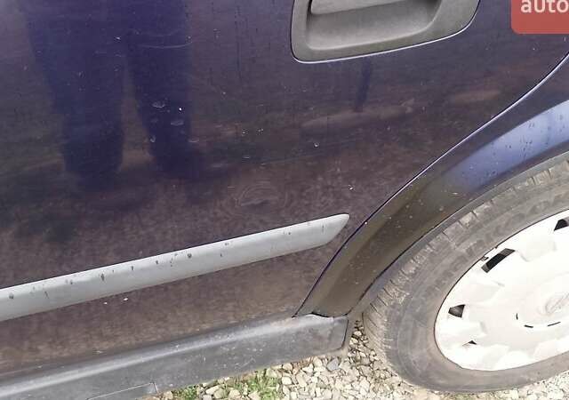 Синий Опель Астра, объемом двигателя 1.7 л и пробегом 401 тыс. км за 2400 $, фото 3 на Automoto.ua