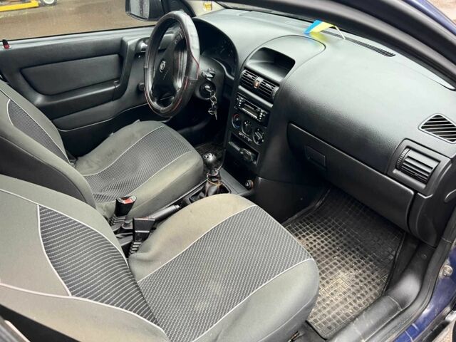 Синій Опель Астра, об'ємом двигуна 1.2 л та пробігом 238 тис. км за 2800 $, фото 14 на Automoto.ua