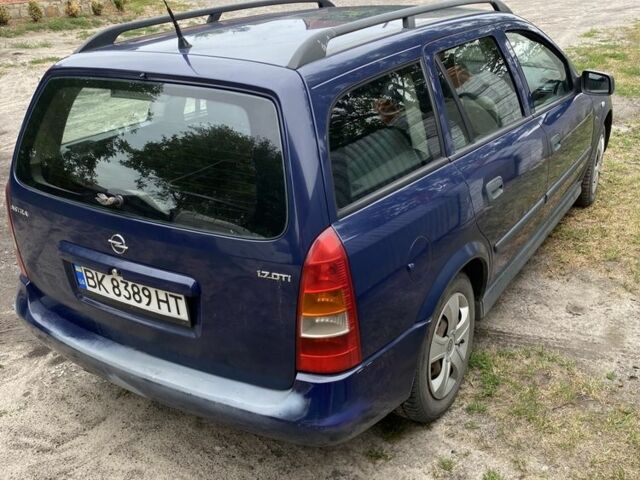 Синий Опель Астра, объемом двигателя 1.7 л и пробегом 324 тыс. км за 2800 $, фото 3 на Automoto.ua