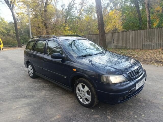 Синій Опель Астра, об'ємом двигуна 2 л та пробігом 310 тис. км за 1600 $, фото 4 на Automoto.ua