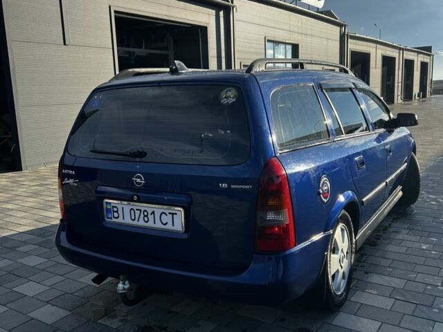Синий Опель Астра, объемом двигателя 1.6 л и пробегом 260 тыс. км за 4300 $, фото 3 на Automoto.ua