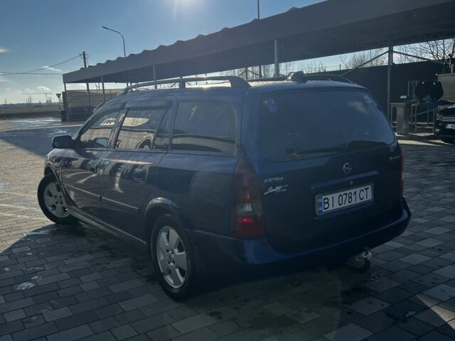 Синий Опель Астра, объемом двигателя 1.6 л и пробегом 260 тыс. км за 4300 $, фото 4 на Automoto.ua