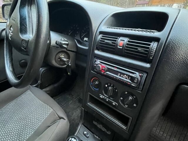 Синий Опель Астра, объемом двигателя 1.6 л и пробегом 342 тыс. км за 3200 $, фото 6 на Automoto.ua