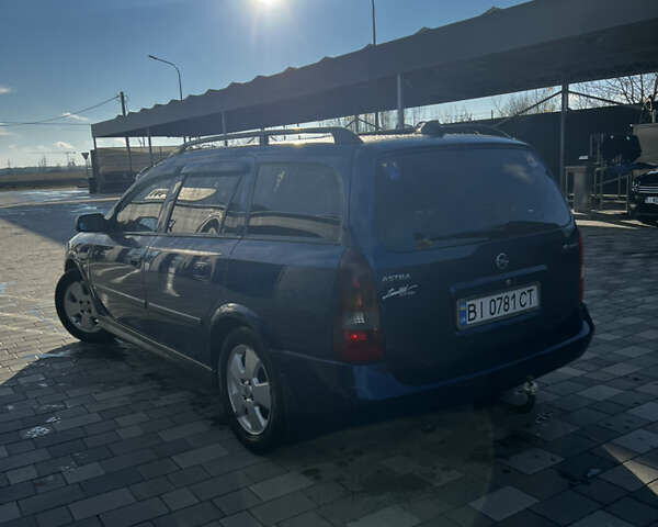 Синий Опель Астра, объемом двигателя 1.6 л и пробегом 260 тыс. км за 4200 $, фото 4 на Automoto.ua