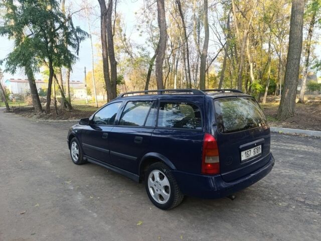 Синій Опель Астра, об'ємом двигуна 2 л та пробігом 310 тис. км за 1600 $, фото 6 на Automoto.ua