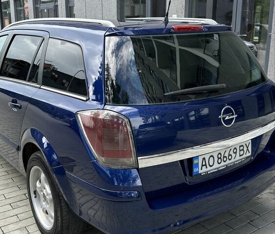 Синий Опель Астра, объемом двигателя 1.9 л и пробегом 350 тыс. км за 4200 $, фото 5 на Automoto.ua