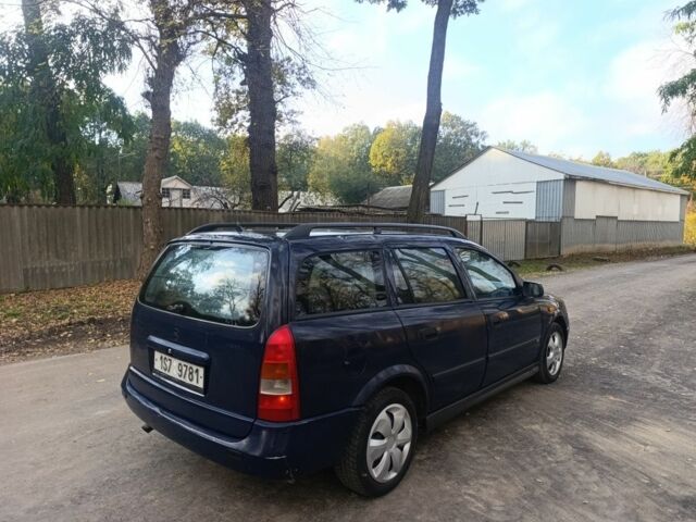 Синій Опель Астра, об'ємом двигуна 2 л та пробігом 310 тис. км за 1600 $, фото 2 на Automoto.ua